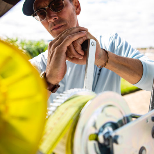 boater using a trailer accessory by Venture Trailers.